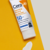 CeraVe Hydrating Mineral Sunscreen spf 50 tube on yellow background