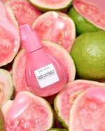 Glow Recipe Guava Vitamin C Dark Spot Serum with guavas at background