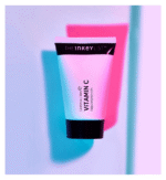 The Inkey List Vitamin C Serum with colorful background
