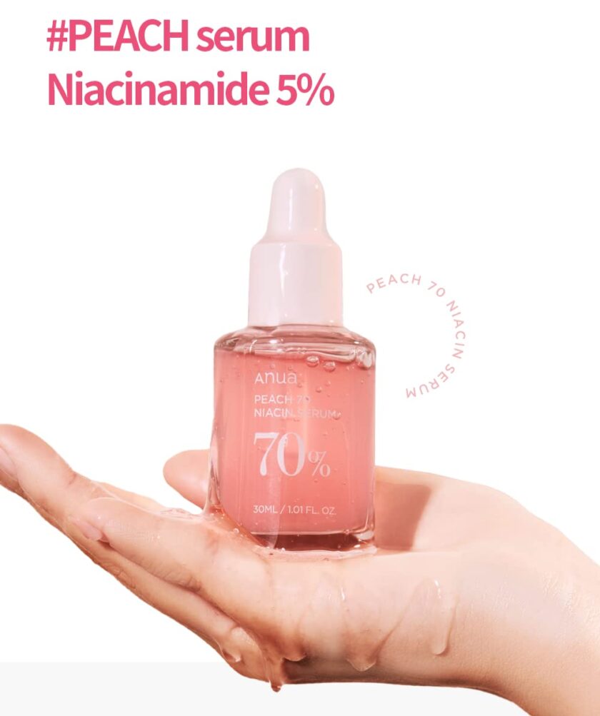 Anua Peach 70 Niacin Serum 30ml bottle in hand