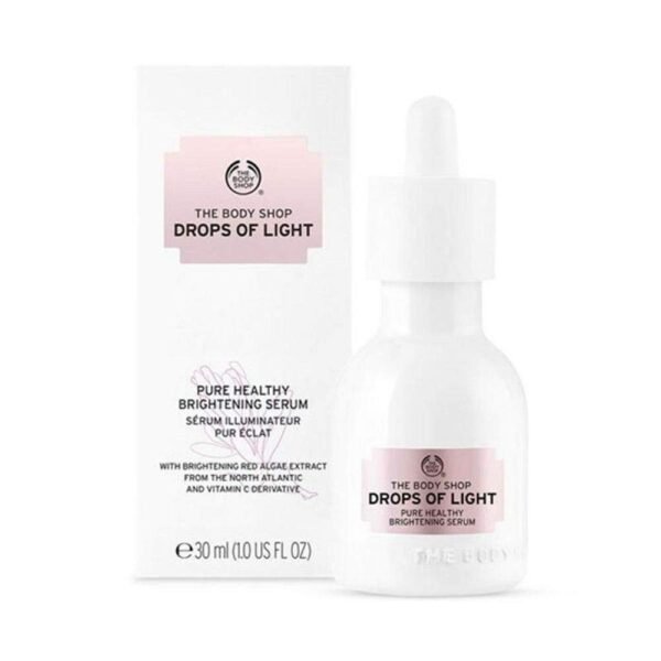 The Body Shop Drops Of Light Pure Healthy Brightening Serum 30ml glass dropper bottle displayed on Glamit Pakistan.
