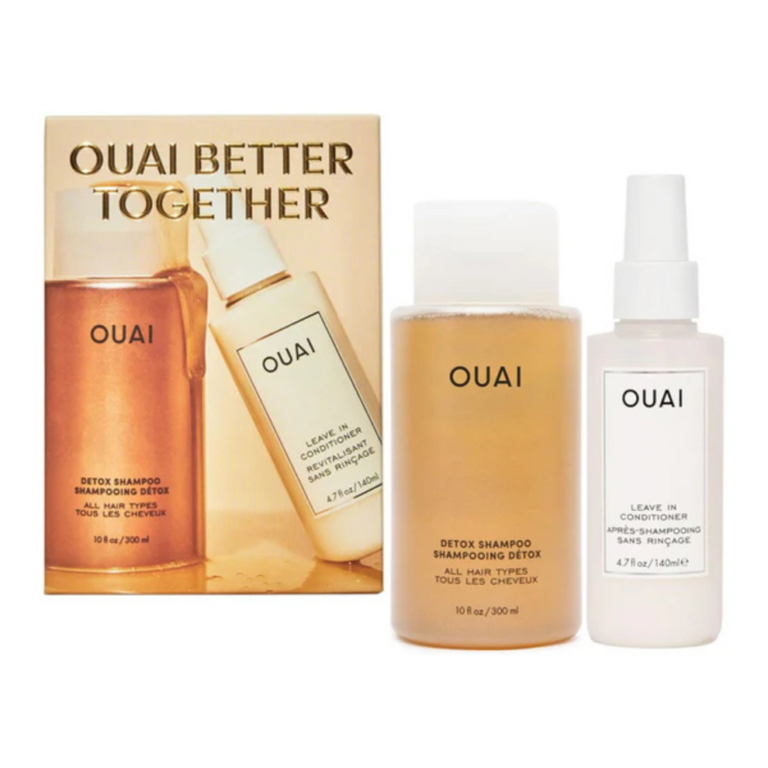 OUAI Better Together hair care set displaying the signature semi-transparent Detox Shampoo bottle alongside the sleek white Leave-In Conditioner spray bottle, available on glamit.pk Pakistan.