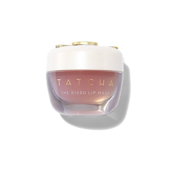 Premium frosted glass jar of Tatcha The Kissu Lip Mask showcasing its translucent peach-tinted jelly formula, complete with its signature gold applicator spatula, available on glamit.pk Pakistan.