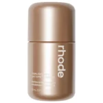 Rhode Highlight Milk Multipurpose Luminizer in Shade 03 pearly warm bronze bottle with sleek minimal packaging available on GLAMIT PK