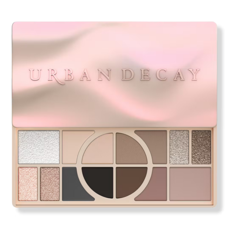 Urban Decay Naked Shaped Multi-Tasking Palette in Cool showing its wavy pink-gold metallic case and open 14-shade layout - Glamit.pk