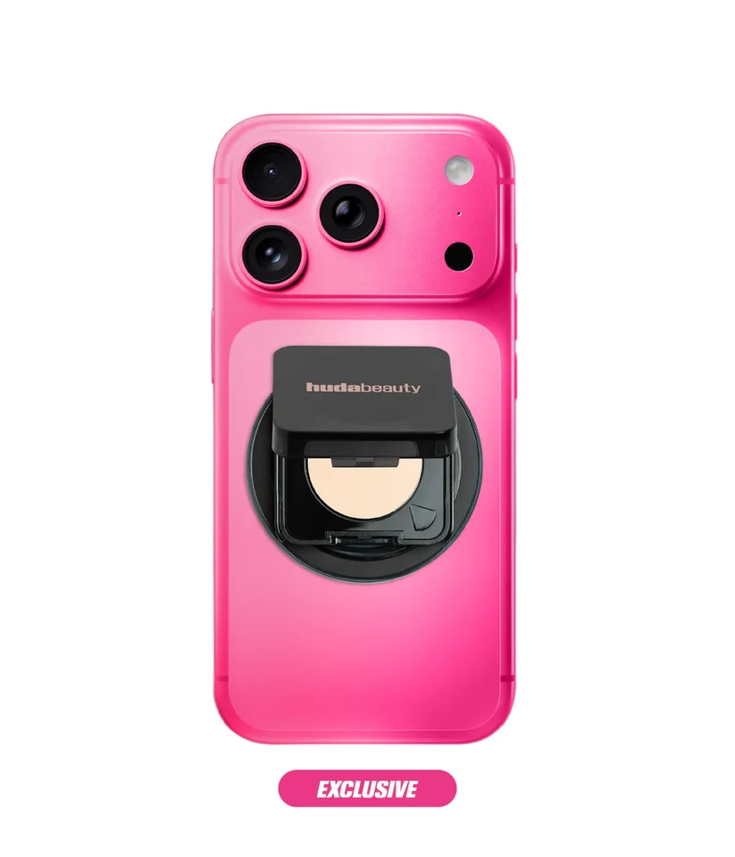 Huda Beauty Easy Bake Pressed Powder Phone Grip attached to a smartphone available on GLAMIT PK