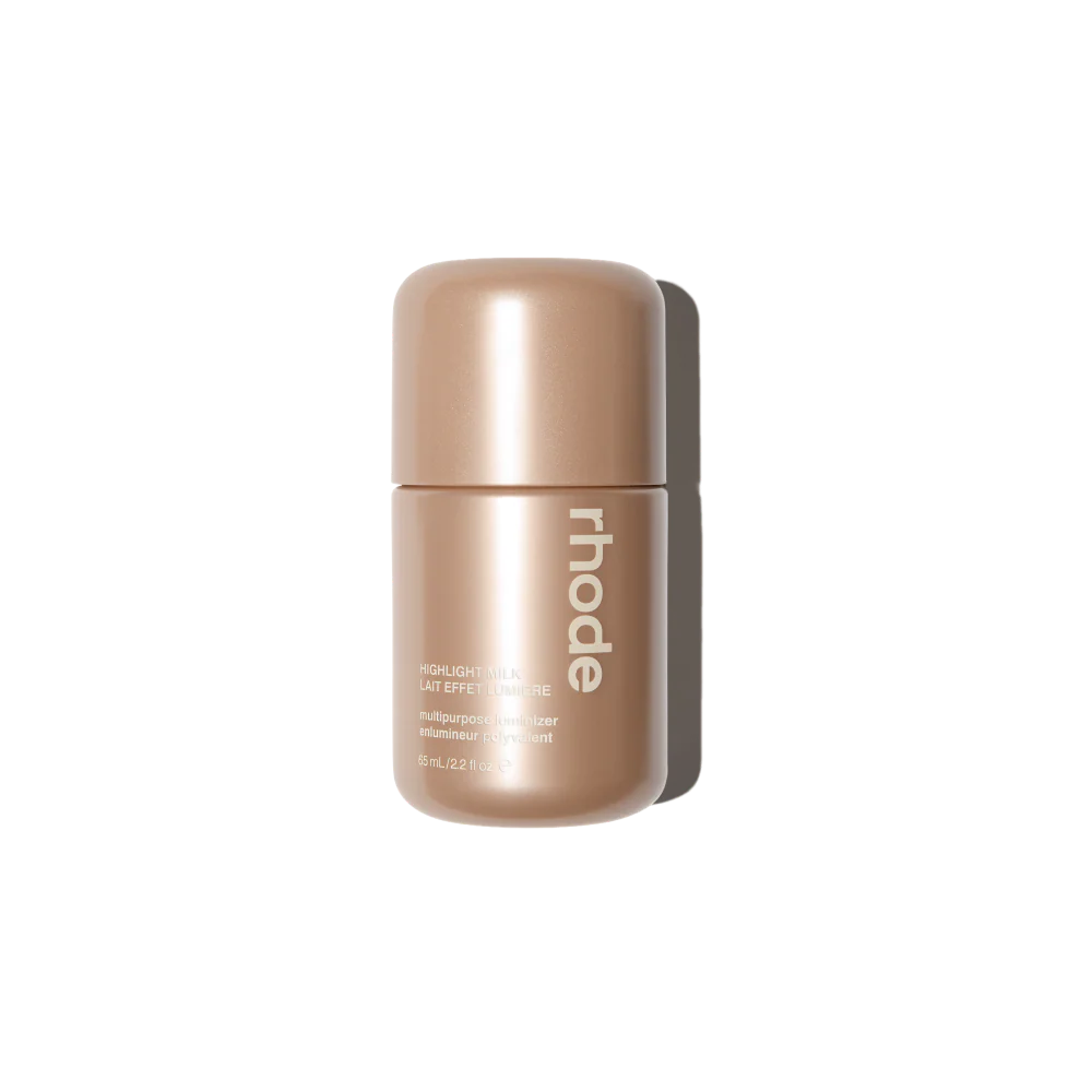 Rhode Highlight Milk Multipurpose Luminizer in Shade 02 pearly champagne bottle with sleek minimal packaging available on GLAMIT PK