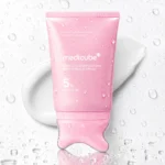 Medicube PDRN Collagen Gua Sha Neck Wrinkle Cream tube with built-in massage head available at Glamit.pk